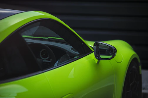 Close-up of Golfrider's sleek dark mode design with neon green accents.
