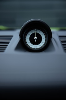 A clock and calendar symbolizing efficient time management for drivers.