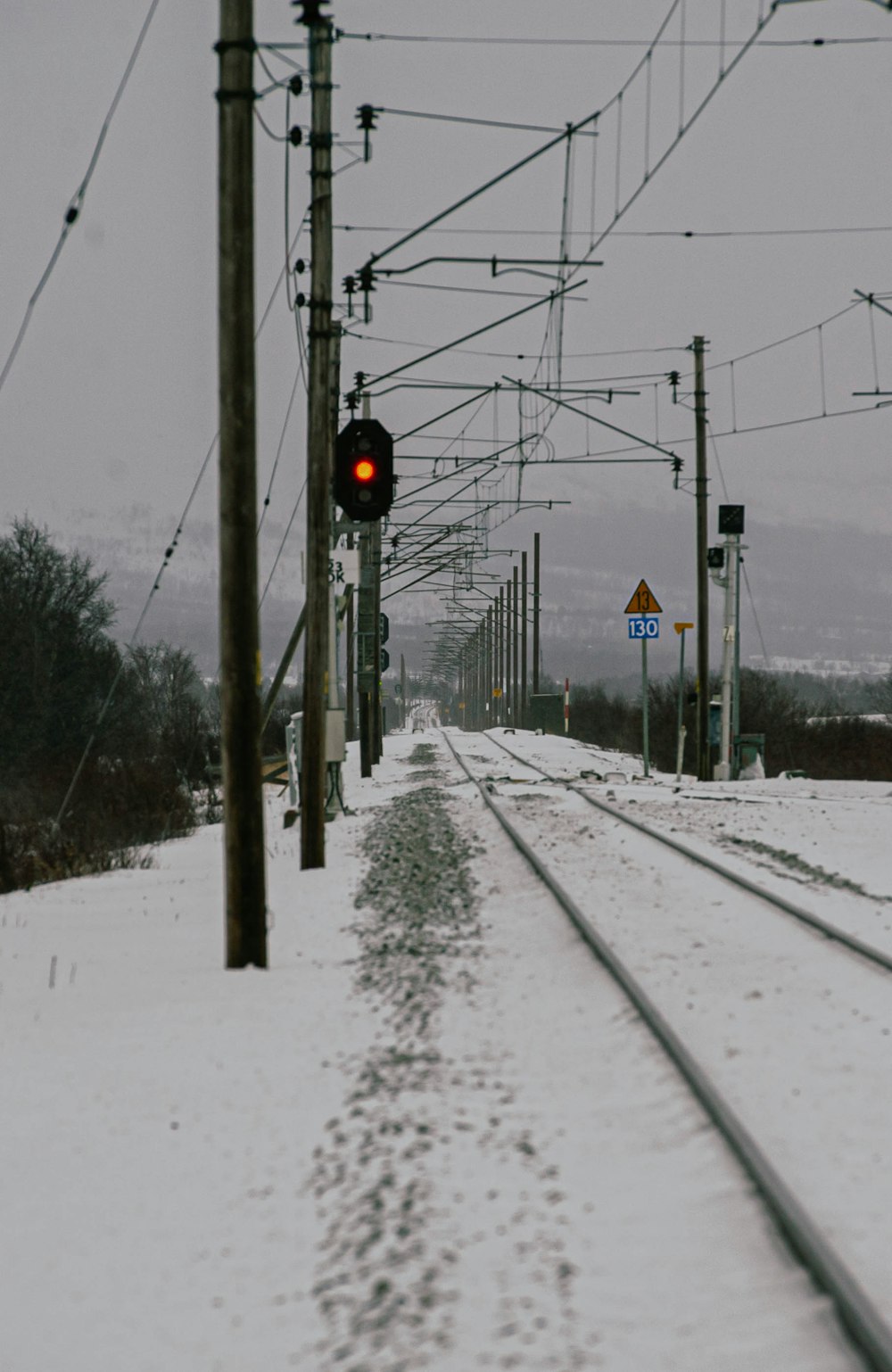 a train track with a red light on it