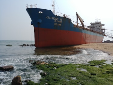 a large ship sitting on top of a body of water