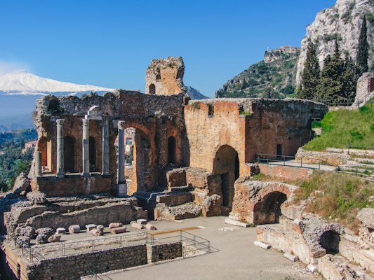 The Greek theatre at Taormina, with Etna snow-capped behind it