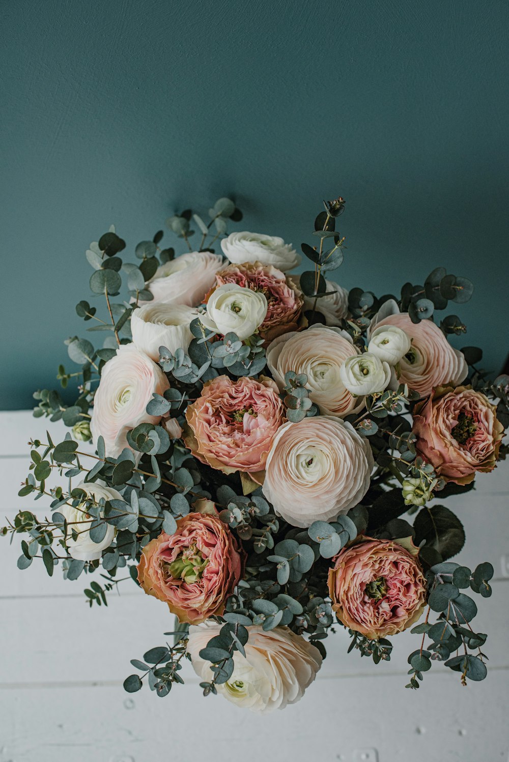 a bouquet of flowers sitting on top of a table