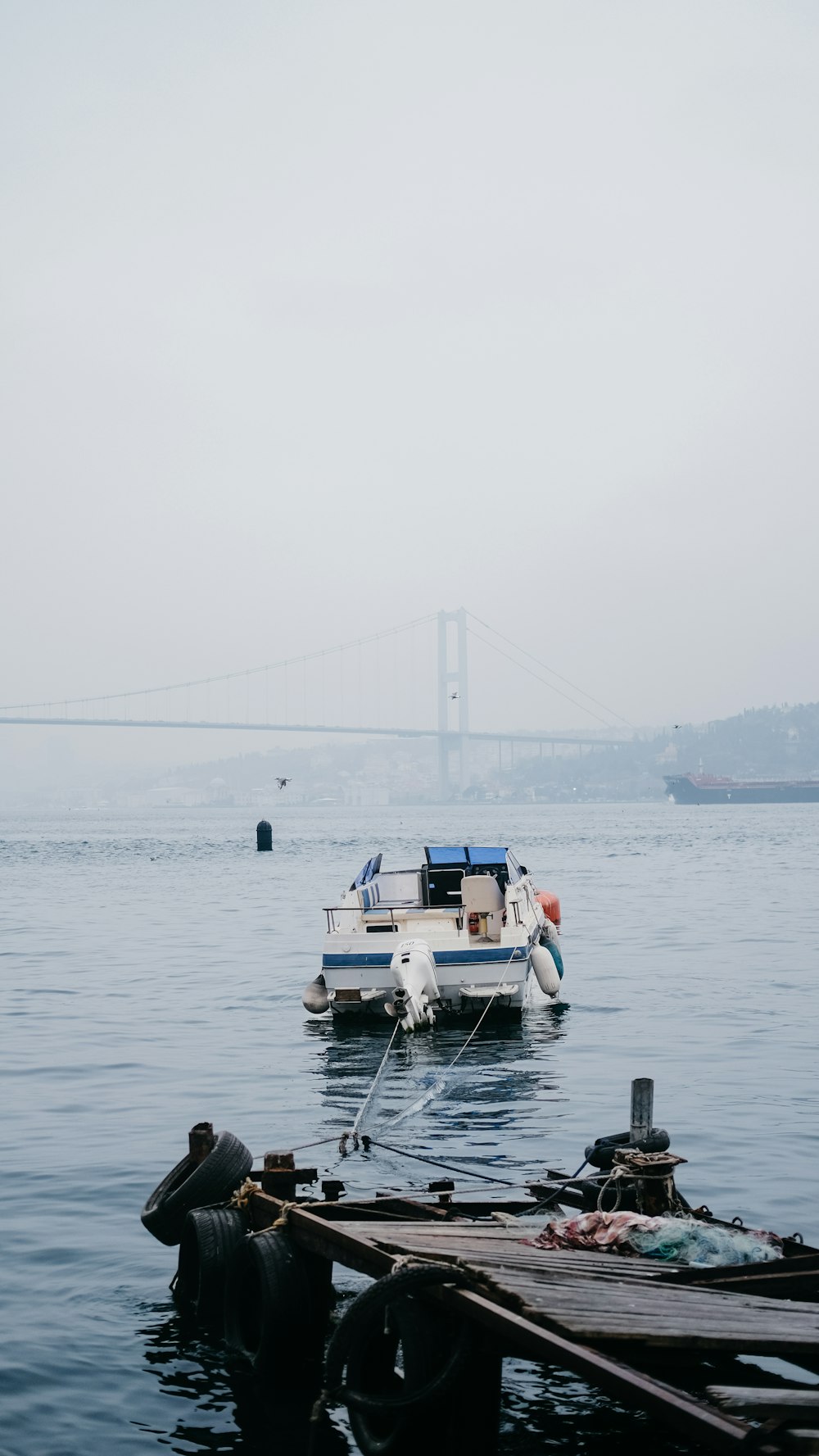 a boat floating on top of a large body of water