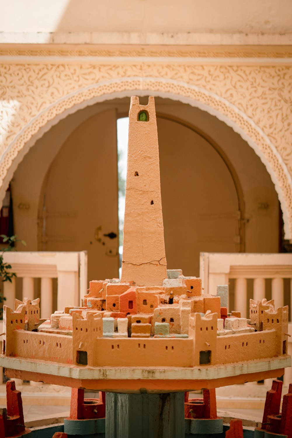 a model of a city with a tower in the middle of it