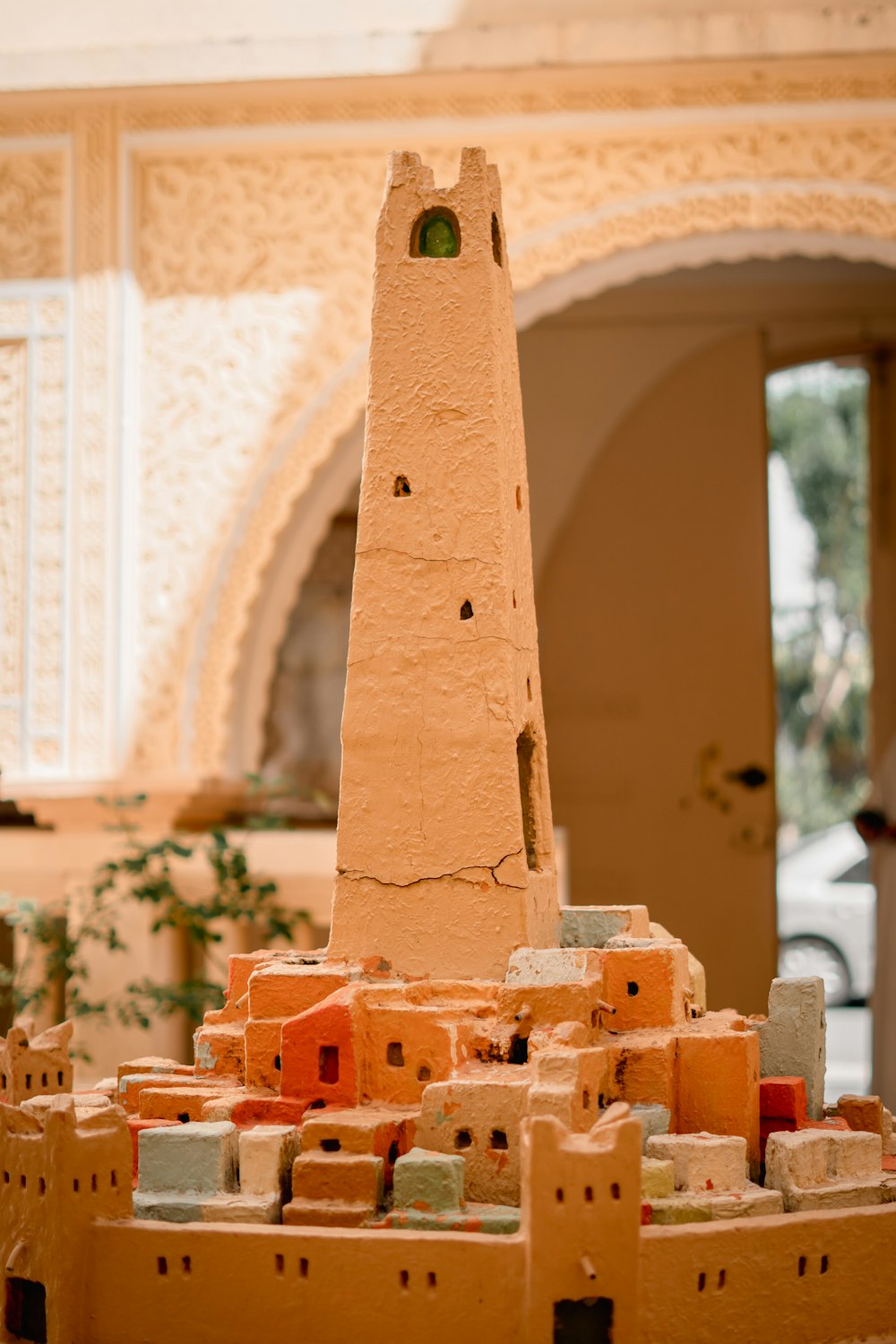a model of a tower made of clay