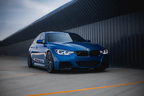 Sleek blue sedan parked on a sunny Benalla street.