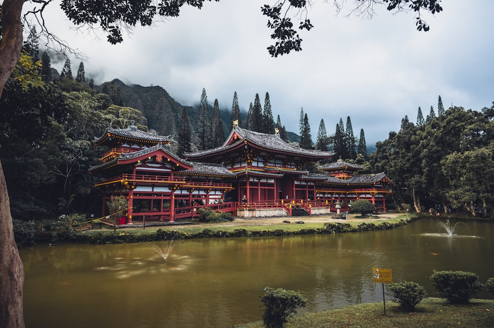 a building with a pond in front of it