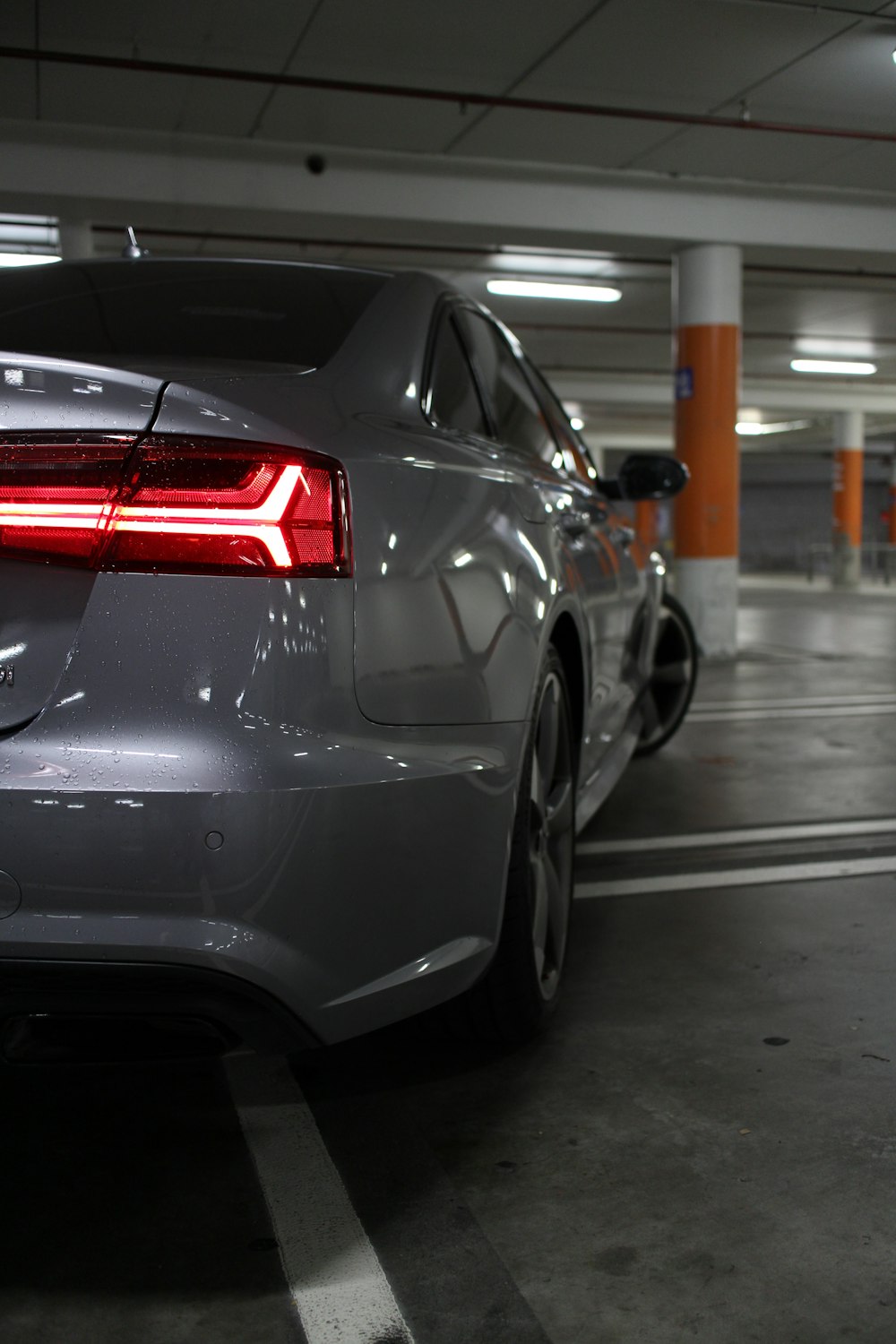 a car is parked in a parking garage