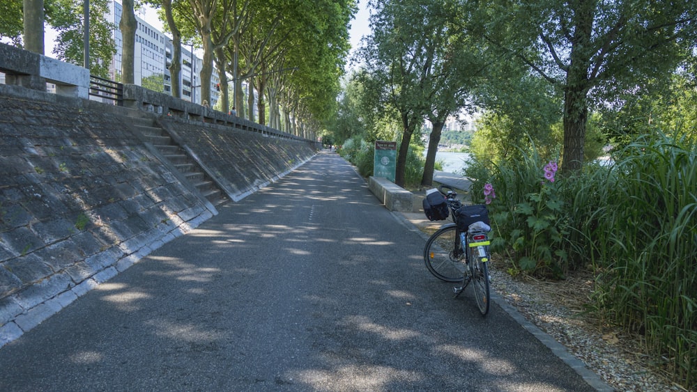 a bike parked on the side of a road