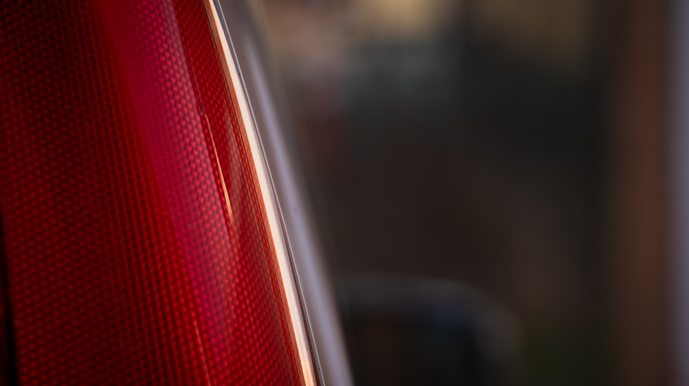 a close up of the tail light of a car