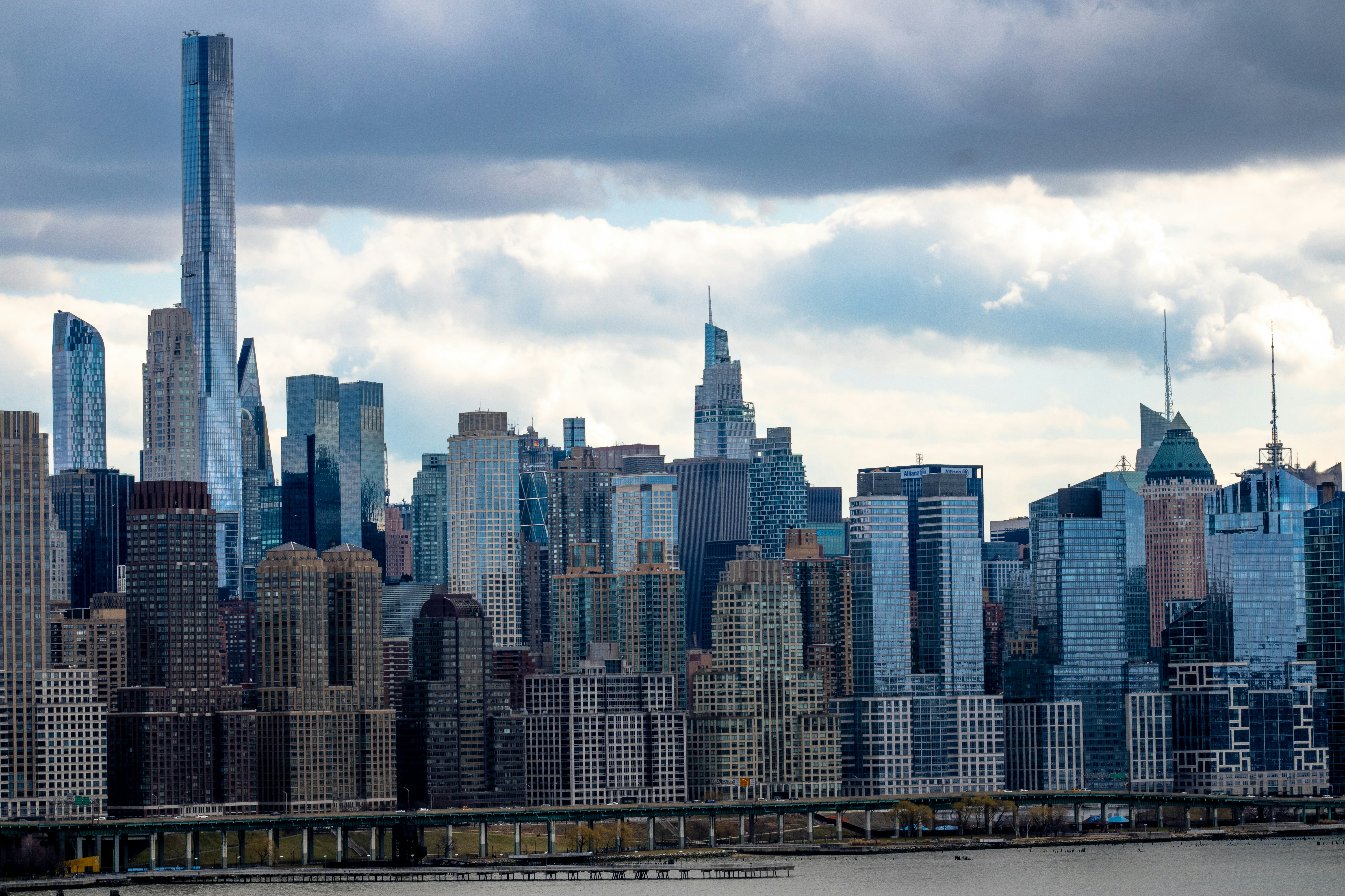 A view of a large city with tall buildings photo Free Weehawken Image on Unsplash