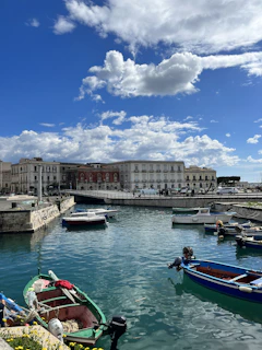 a bunch of boats that are sitting in the water