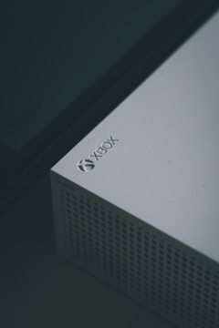 A close-up of a gaming console and screen.