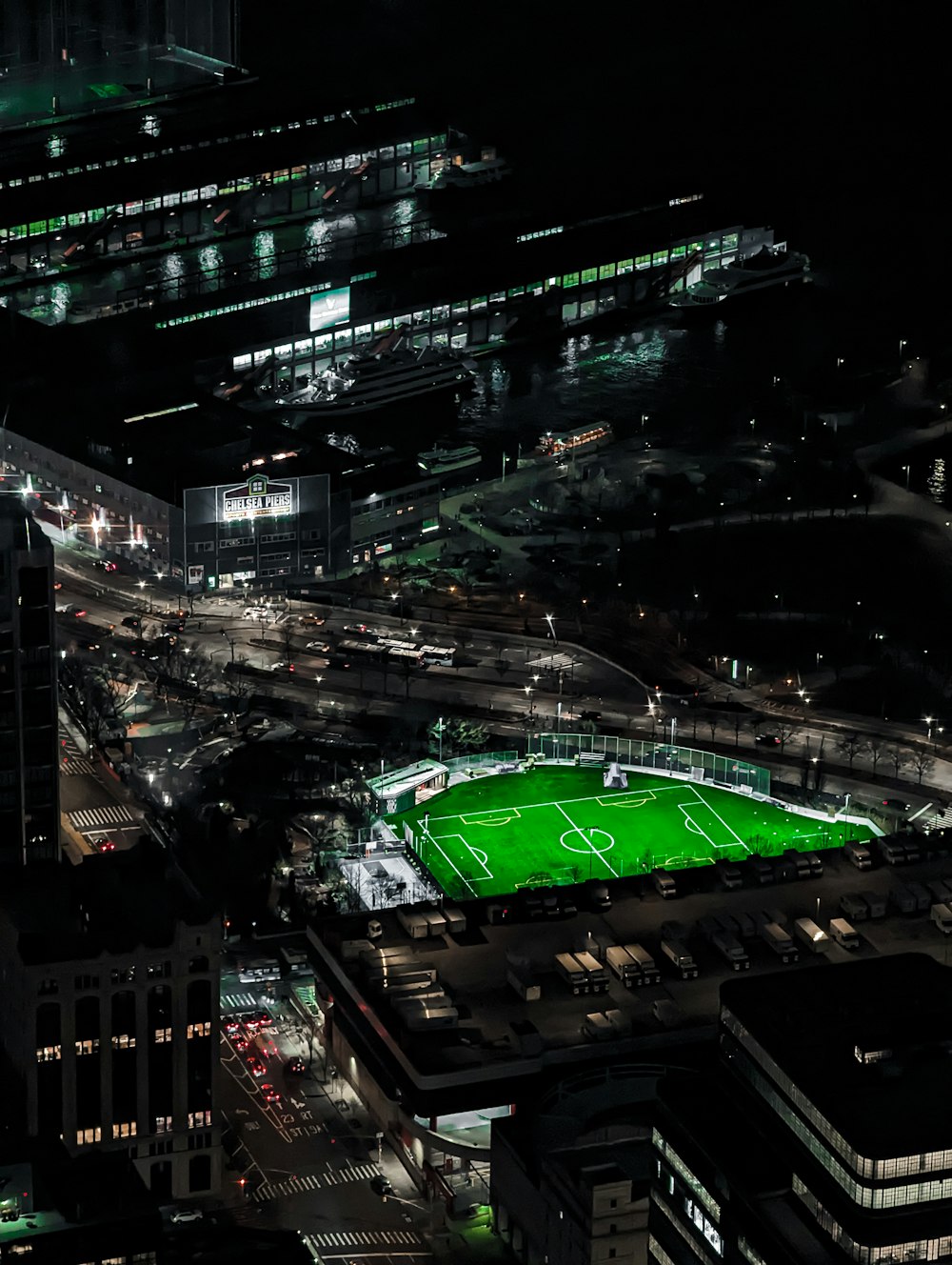 an aerial view of a soccer field at night