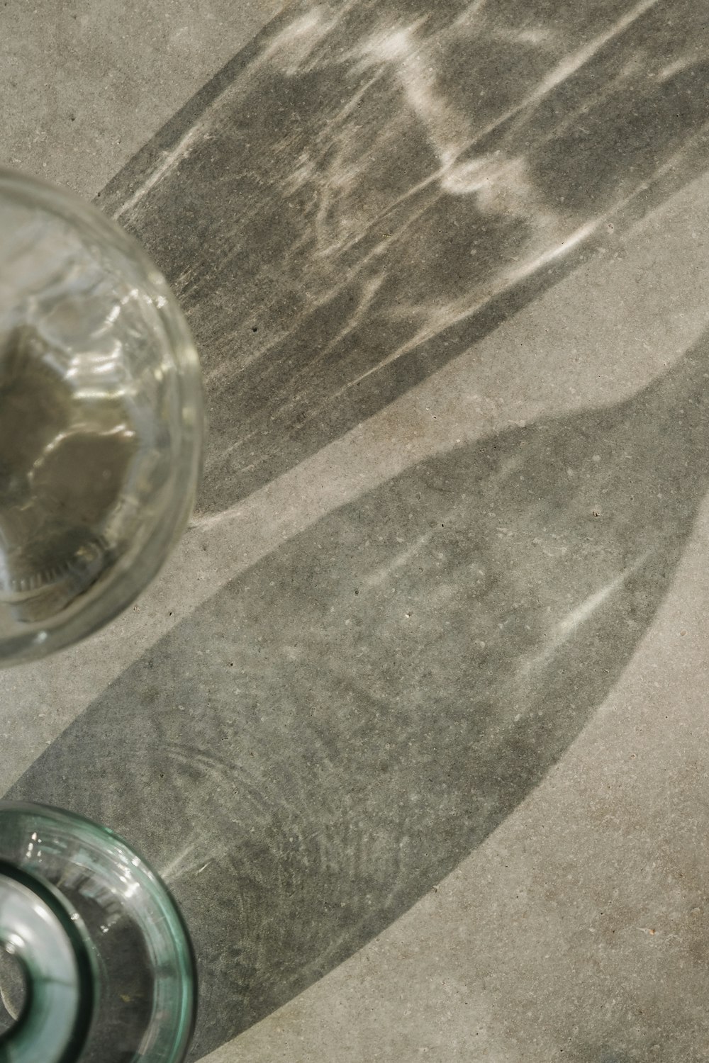 a glass bottle sitting on top of a table