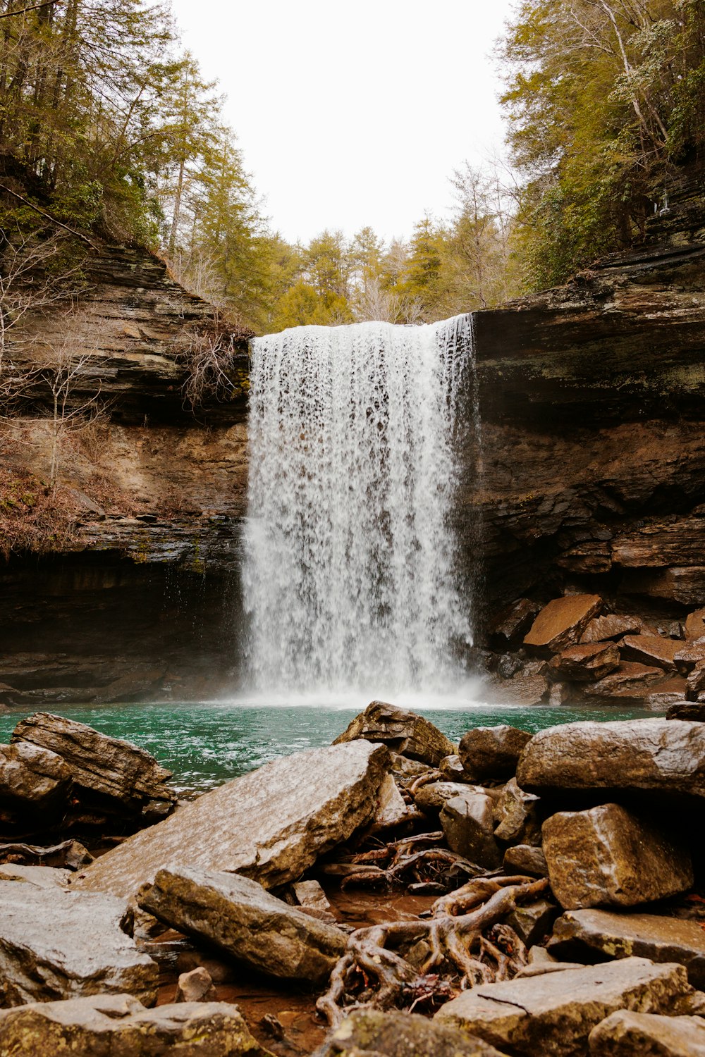 a waterfall with a large amount of water coming out of it