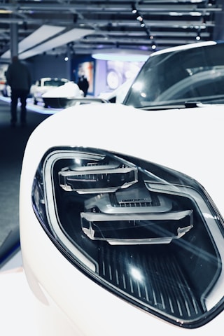 A modern workshop showcasing automotive lamp production processes.