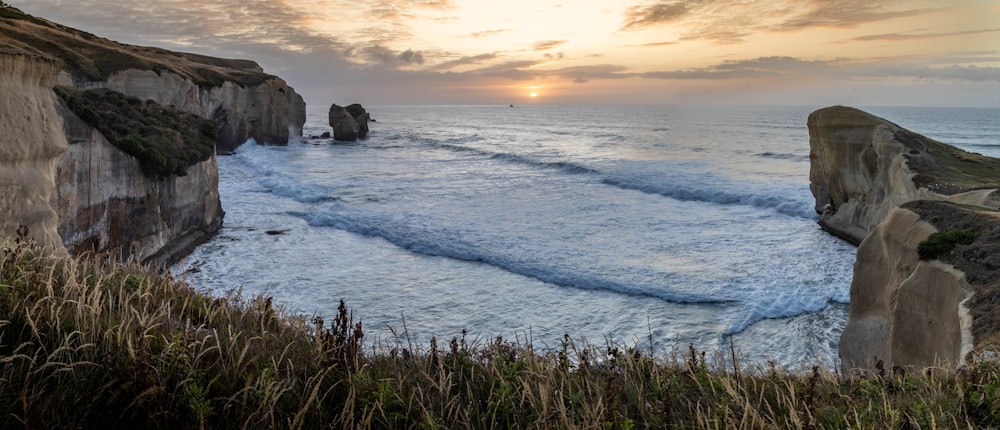 a view of the ocean from a cliff