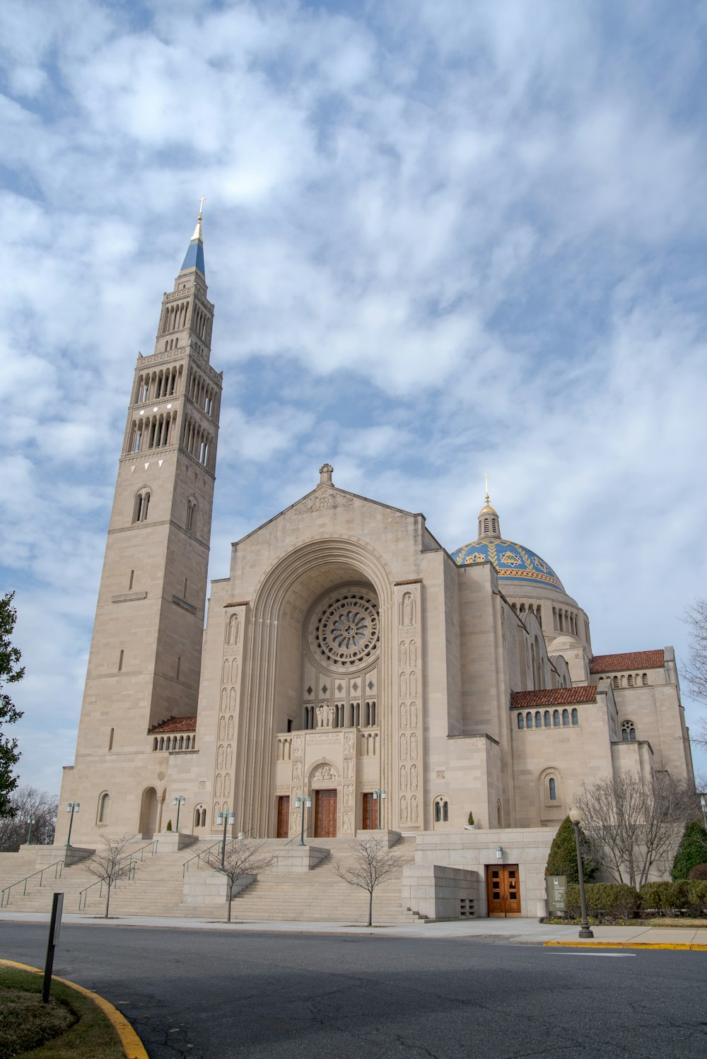 a large church with a clock tower on the side of it