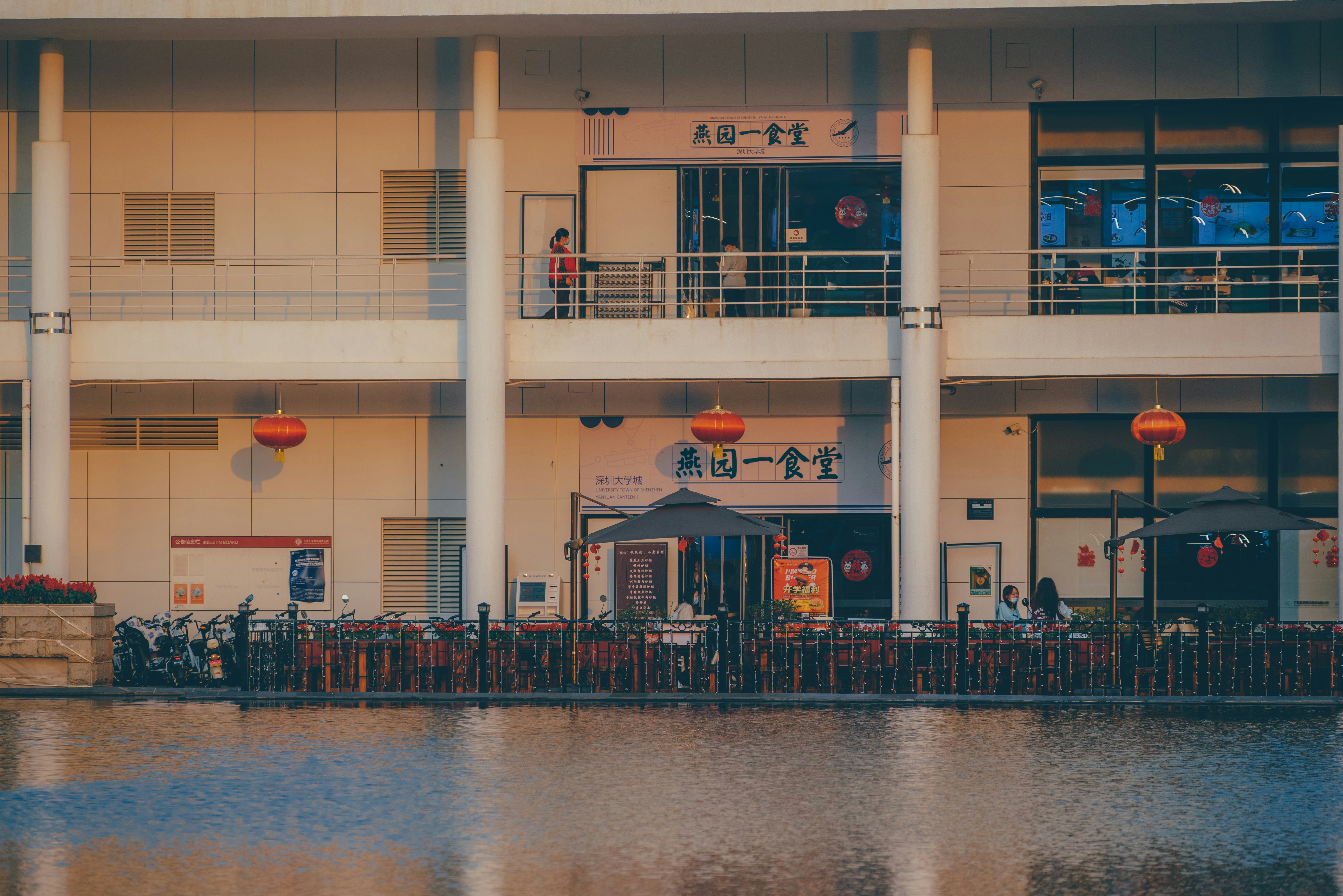 a tall building with a balcony and balconies