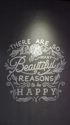 A beautifully illustrated poster showcasing motivational quotes surrounded by floral patterns.
