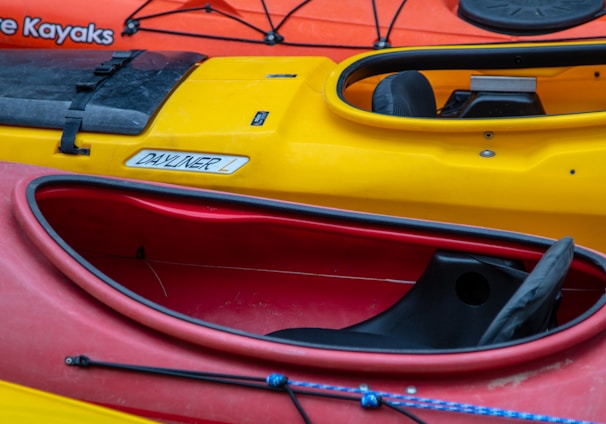 a row of kayaks lined up in a row