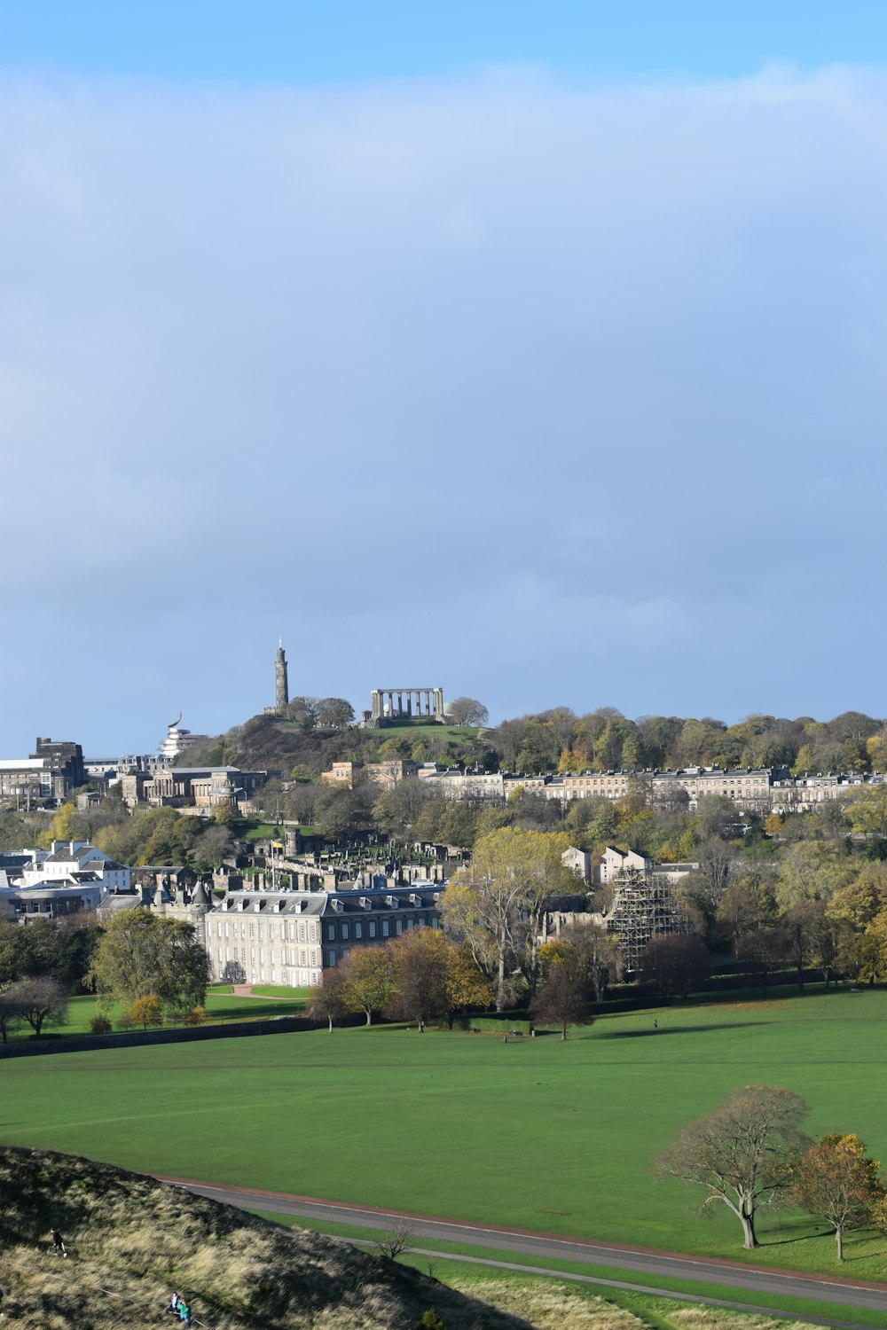 a view of a city from a hill