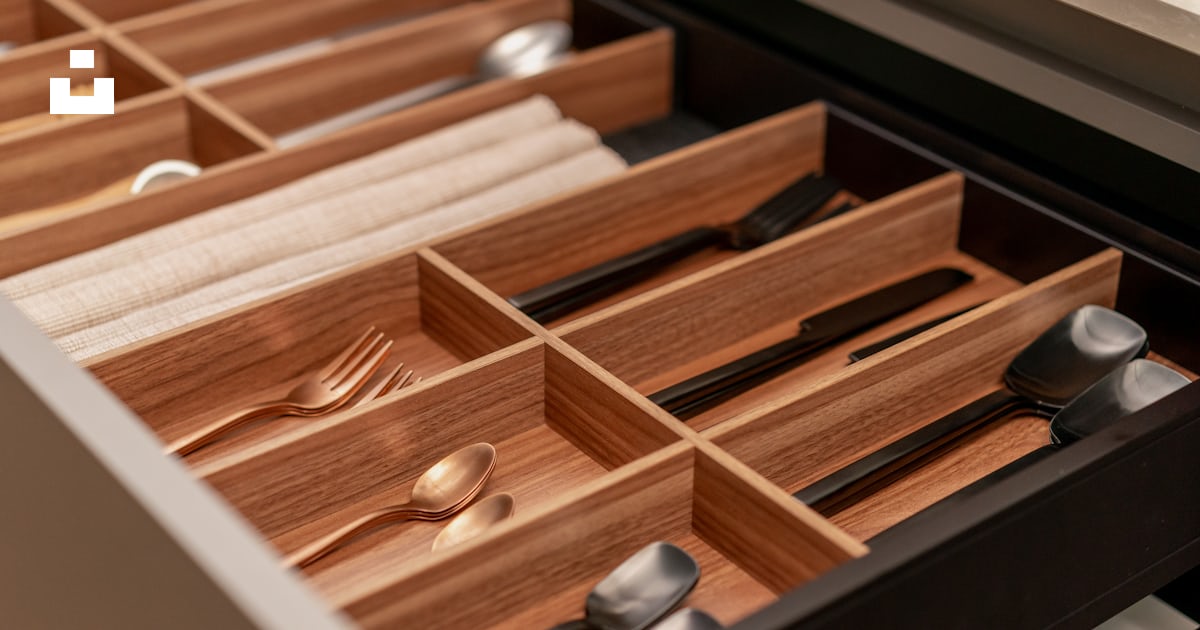 A drawer with utensils and spoons in it photo Free Cutlery Image