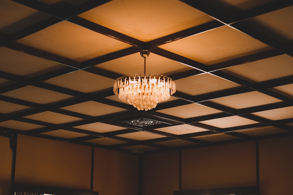 a chandelier hanging from the ceiling of a room