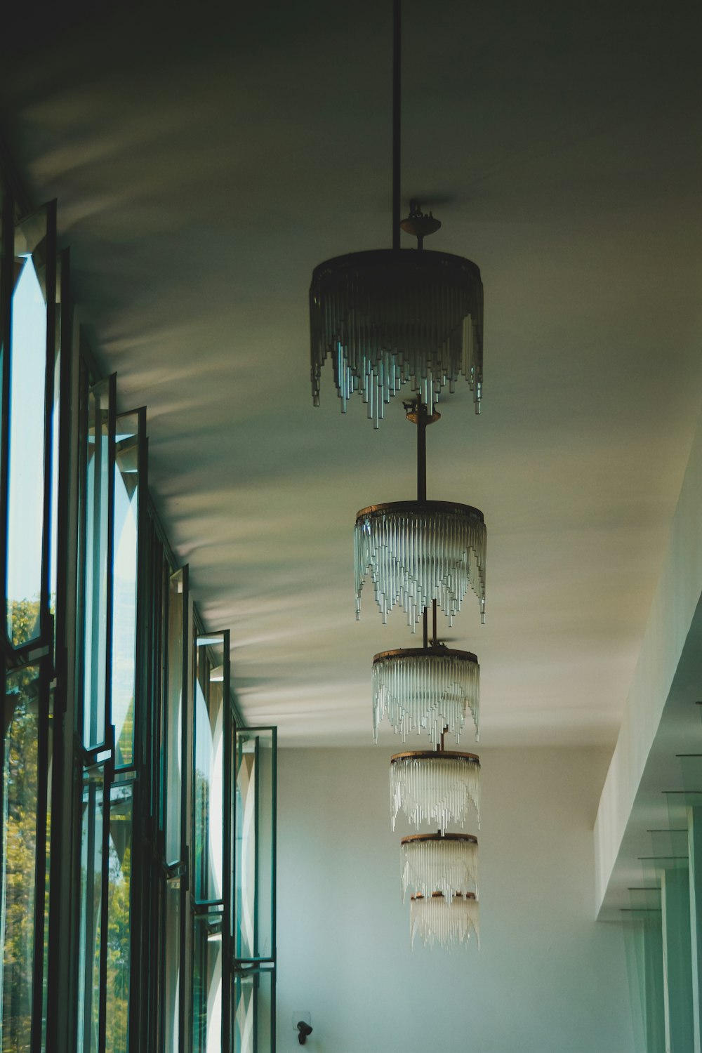 a chandelier hanging from the ceiling of a room