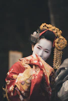 A digital portrait of a woman wearing traditional kimono with futuristic elements.