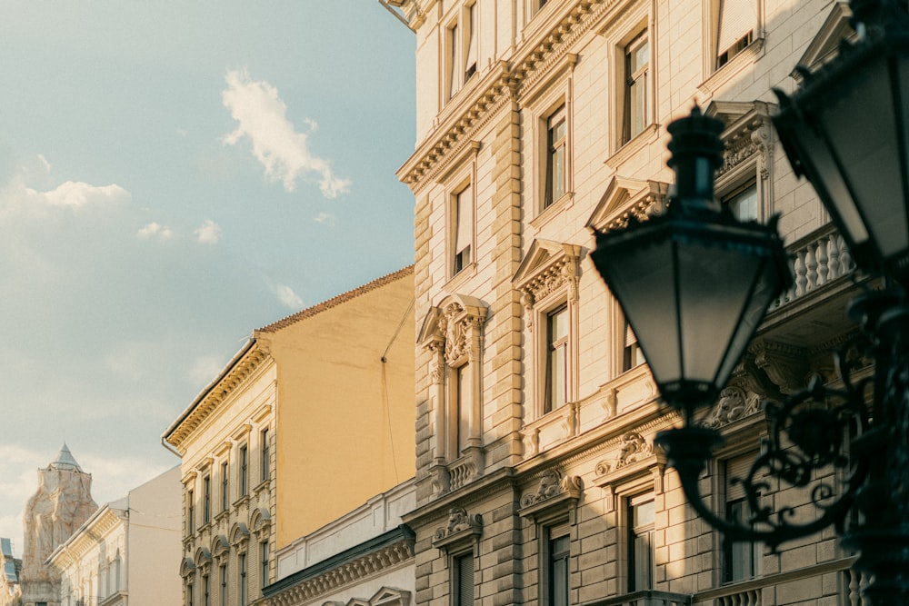 a clock on a pole in front of a building