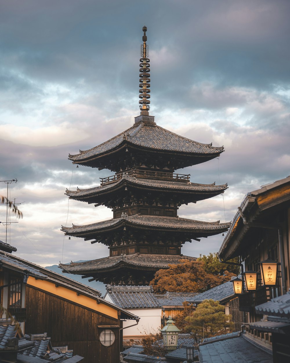 a tall building with a tower in the middle of it