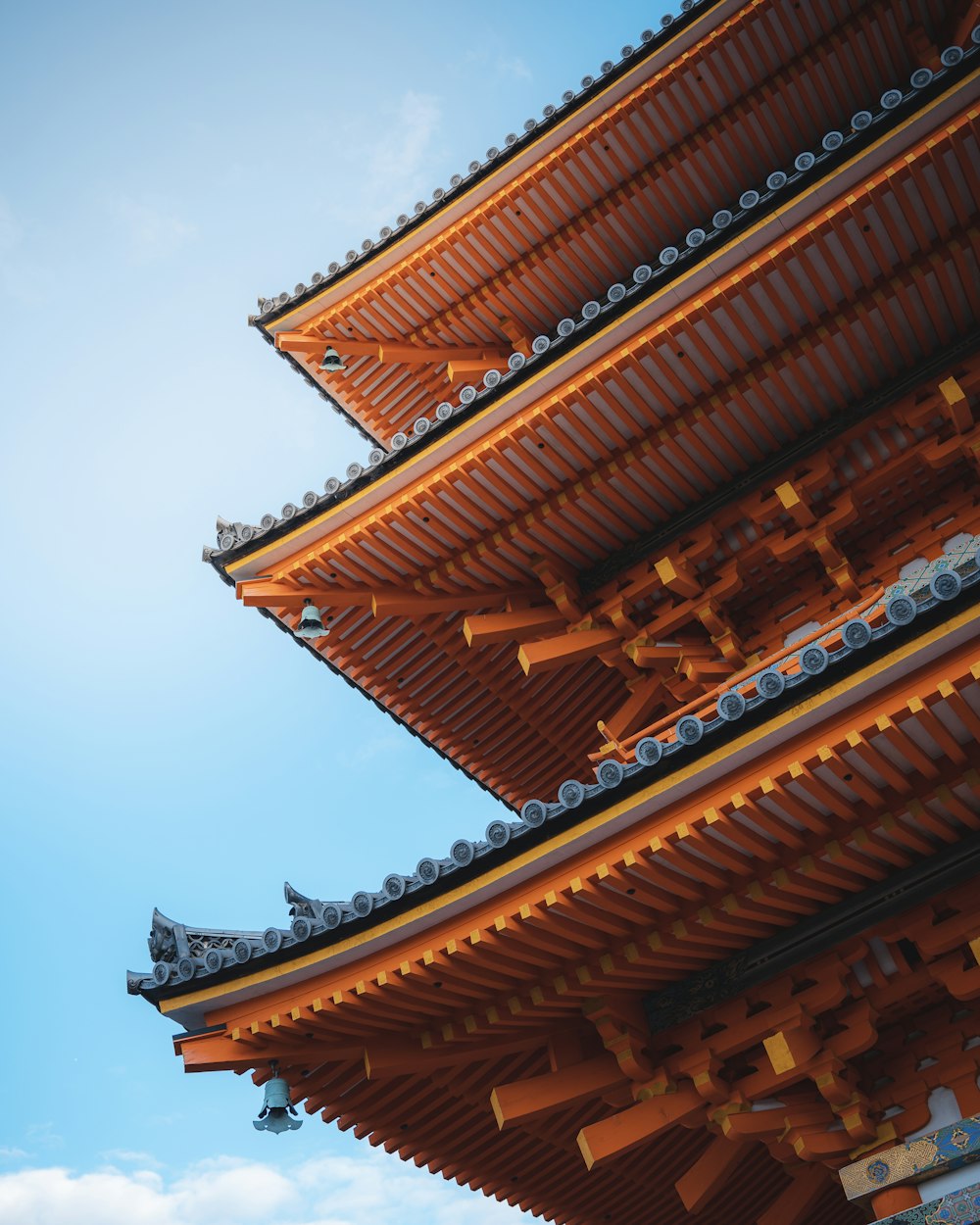 a tall building with a sky in the background