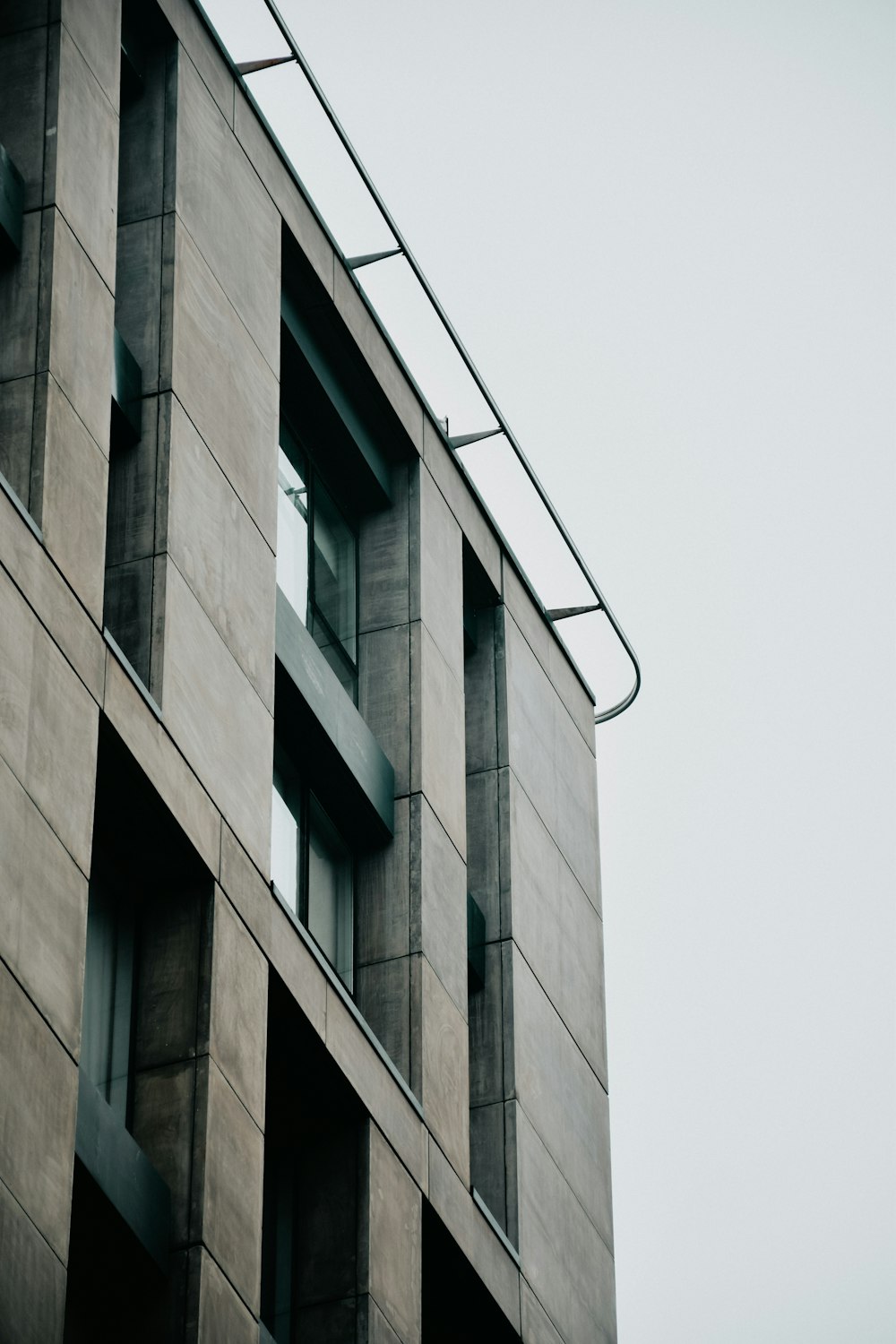 a very tall building with some windows on it