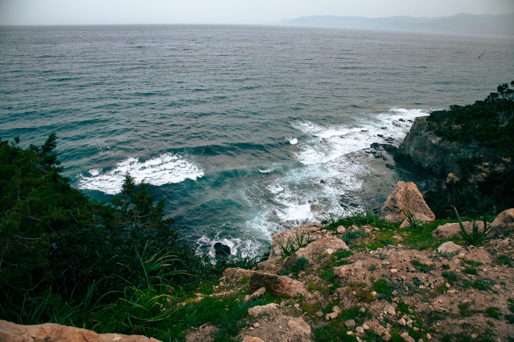 a view of the ocean from a cliff