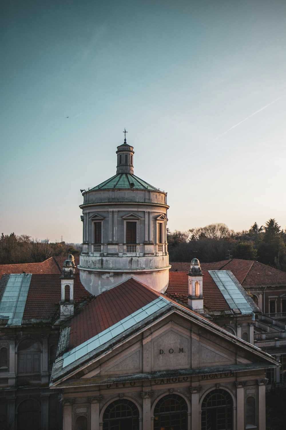 a building with a tower and a clock on top of it