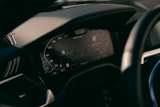 Close-up of a car dashboard with modern digital controls.