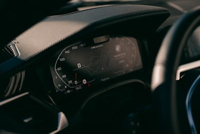 A close-up of a car dashboard showing modern features