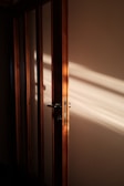 A freshly installed door glowing in natural sunlight at a customer's home.