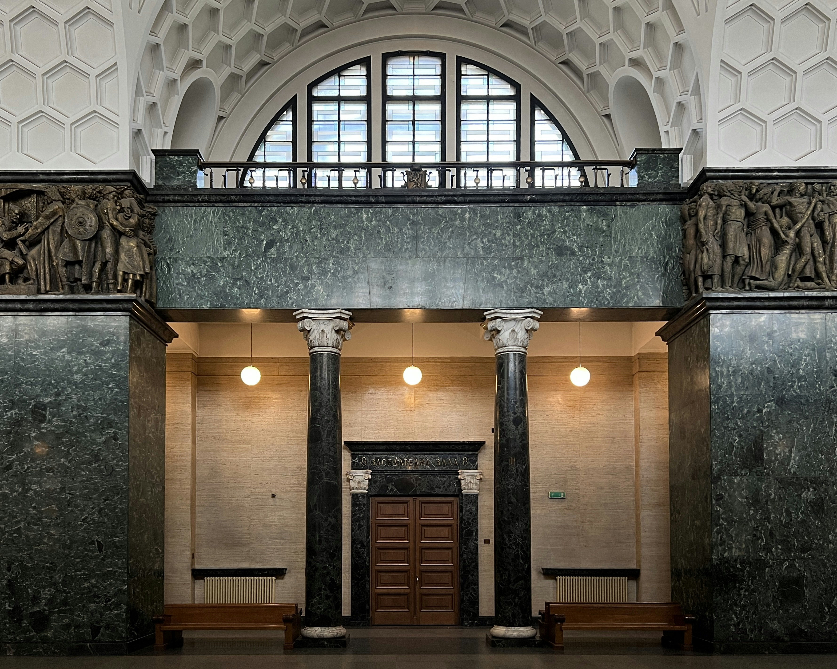 a large building with columns and a door