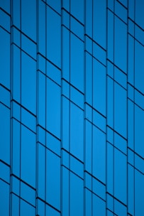 an airplane is flying in the blue sky