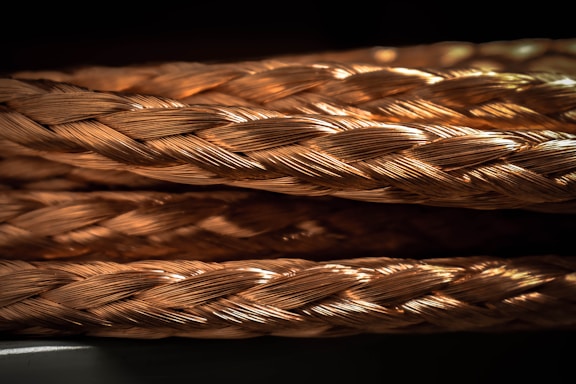 a close up of a rope on a black background