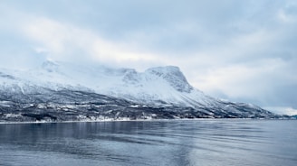 A serene Nordic mountain landscape symbolizing calm and security.