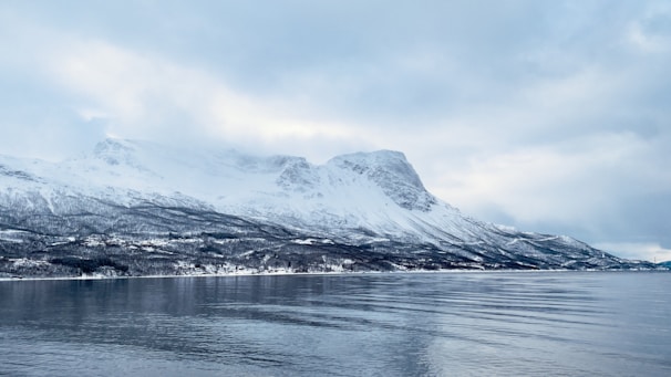 A serene Nordic mountain landscape symbolizing calm and security.