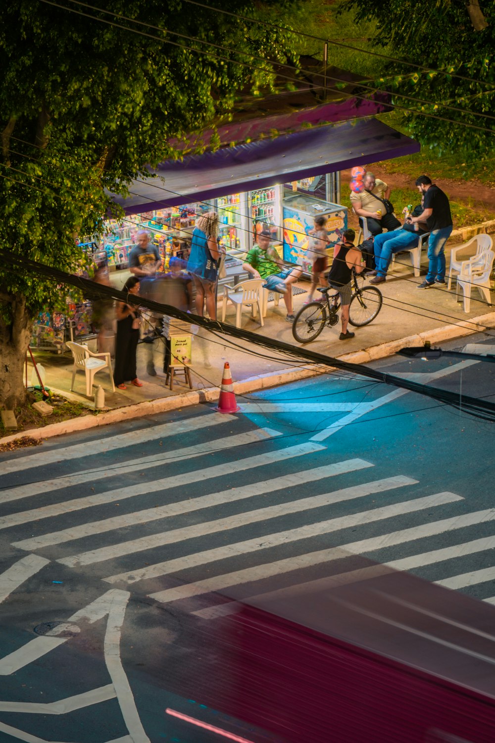 a person riding a bike on a city street