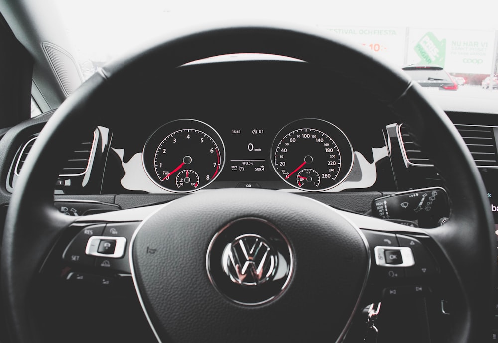 the dashboard of a car with gauges and dash lights