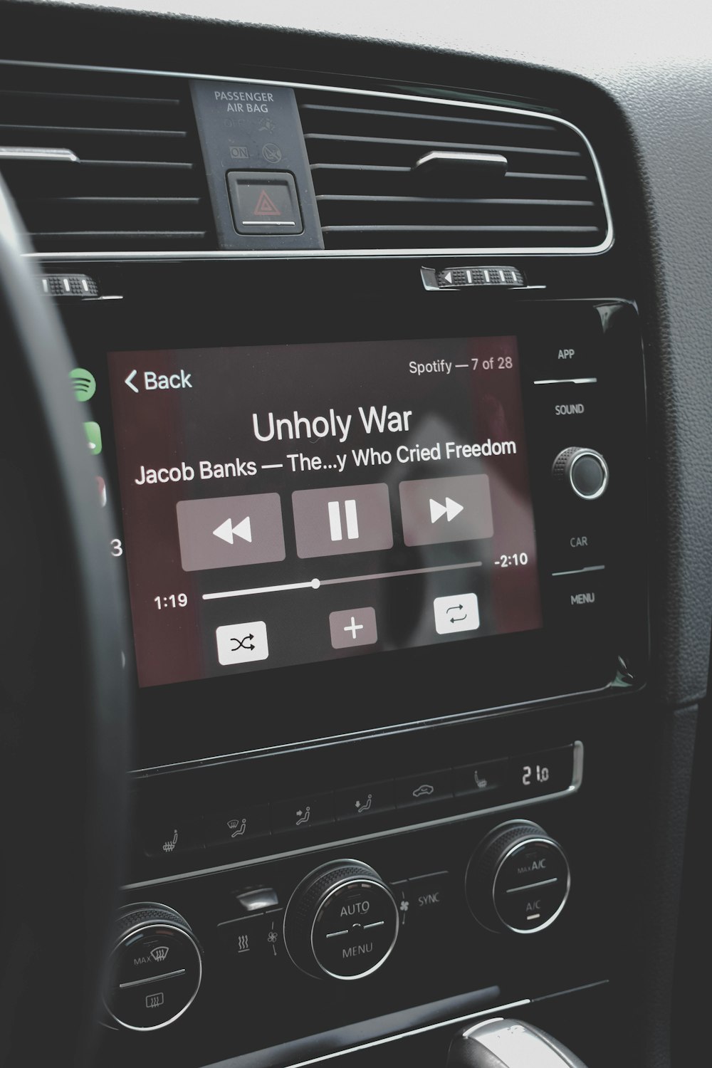 a car dashboard with an electronic device on it