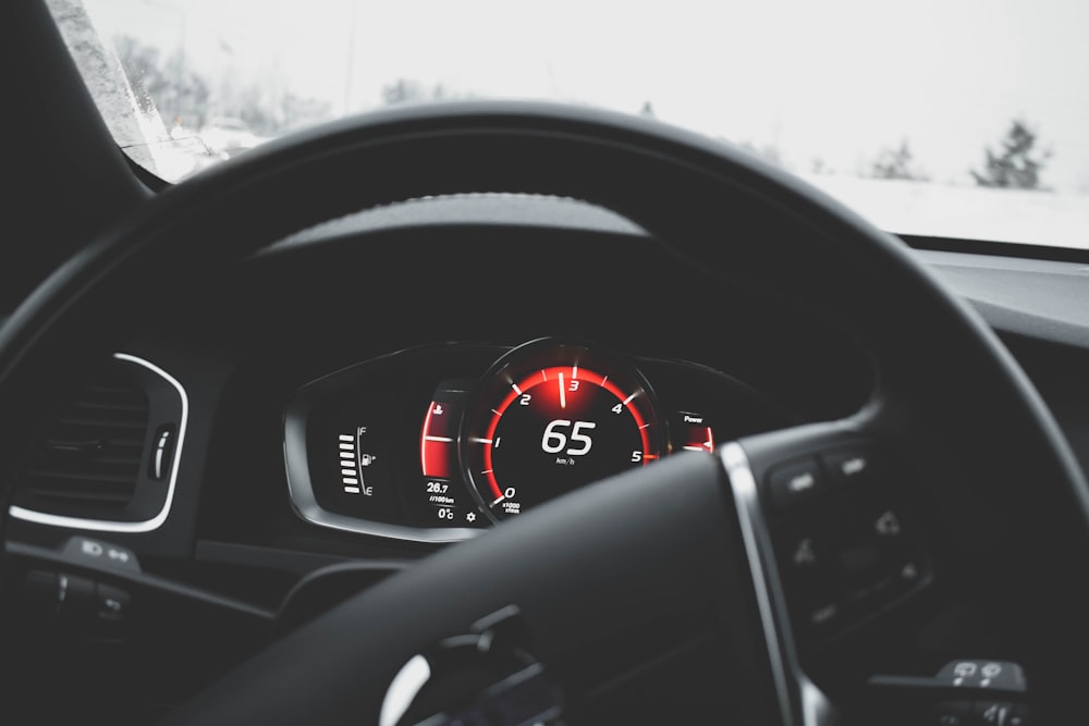 the dashboard of a car with a speedometer