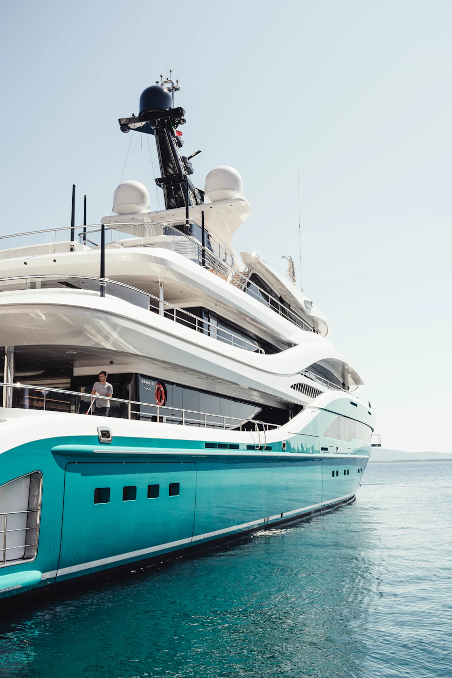 Solstice, a large blue-hulled superyacht under way on open water